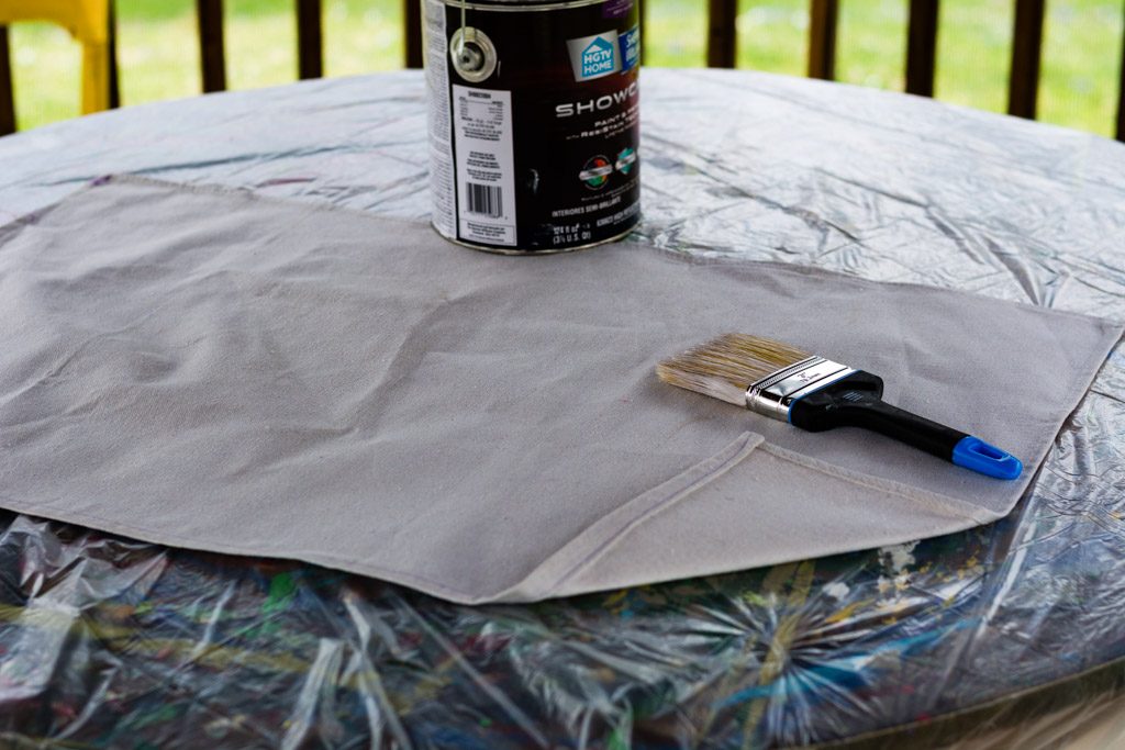 Image of hemmed canvas in outdoor workspace